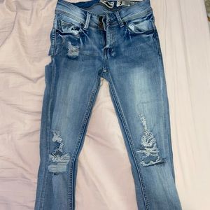 light wash skinny ripped jeans